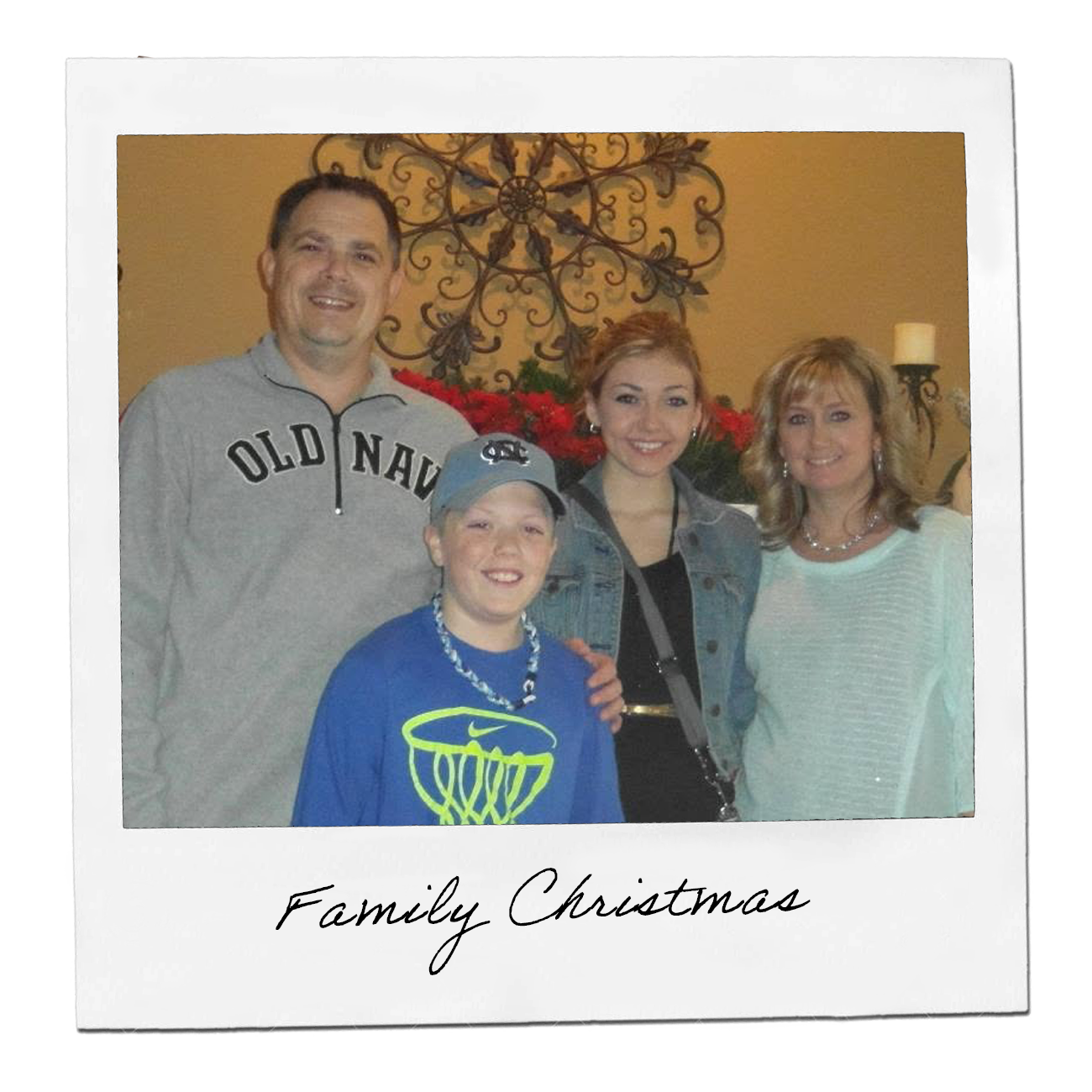 Polaroid: family of four posing together at Christmas